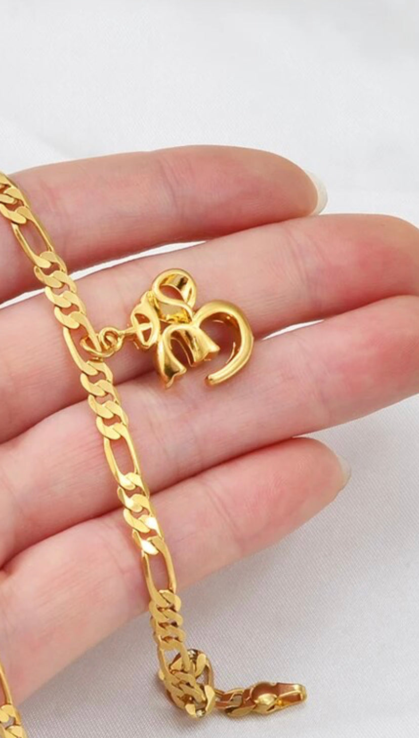 Gold Om bracelet