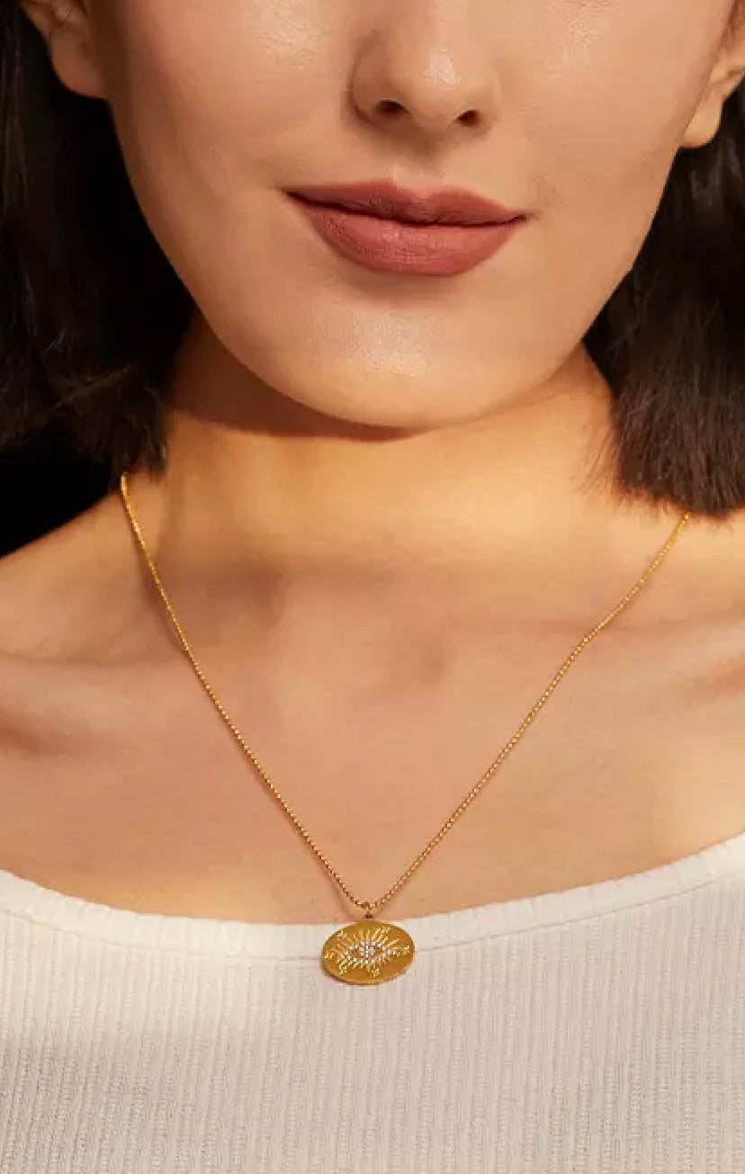 Gold evil eye circle necklace