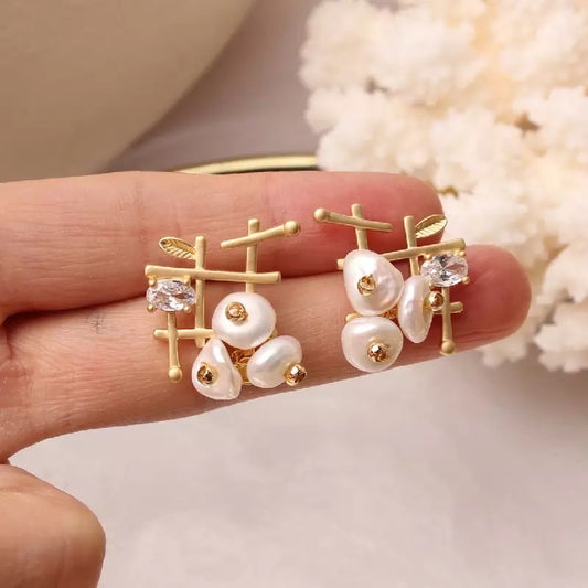 Gold pearl earrings