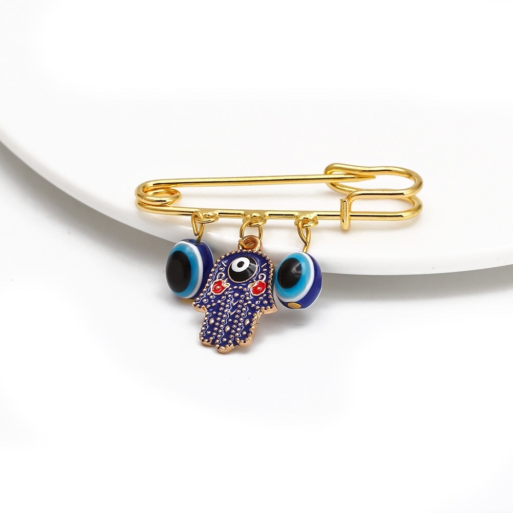Evil eye baby pin brooch