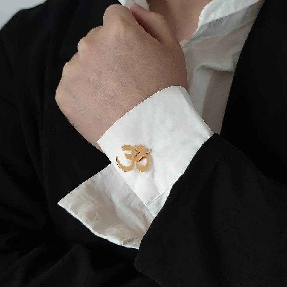 Om cufflinks