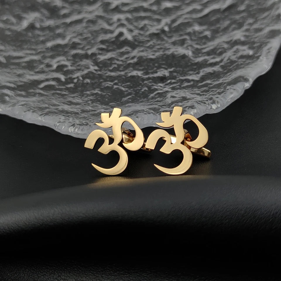 Om cufflinks