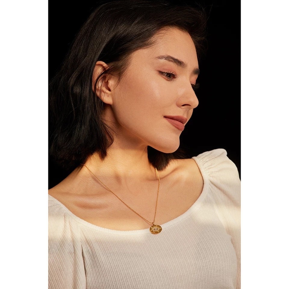 Gold evil eye circle necklace