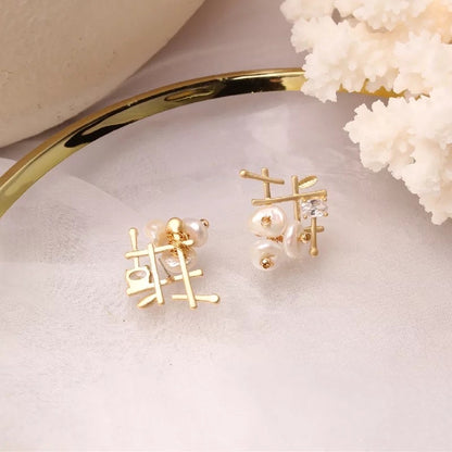 Gold pearl earrings