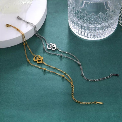 Om layered bracelet