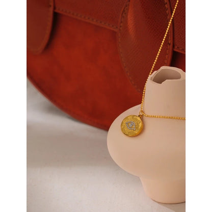Gold evil eye circle necklace