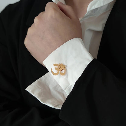 Om cufflinks